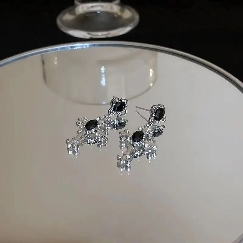 Boucles d'oreilles avec motif croix gothique