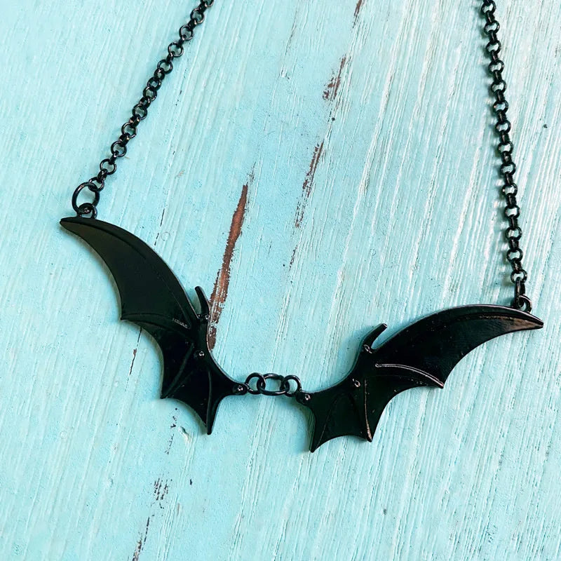 Tour de cou avec motif chauve-souris