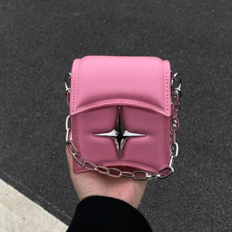 Handtasche an einer Kette mit Kreuz - rosa